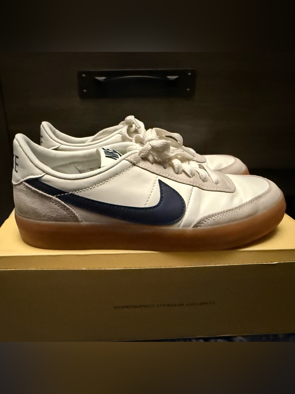Nike White Leather Sneakers with Navy Swoosh and Gum Sole
